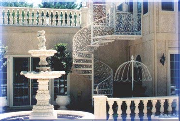 Spiral stairs and ornate ironwork